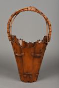 A 19th century Japanese bamboo Ikebana basket Of tapering sectional construction with loop handle.
