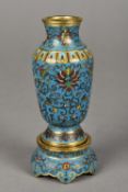 A Chinese cloisonne vase with stand Both typically decorated with lotus strapwork,