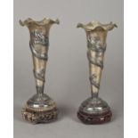 A pair of Chinese silver bud vases Each of flared trumpet form,