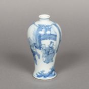 A Chinese blue and white porcelain baluster vase Decorated with figures on a terrace,