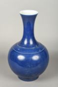 A Chinese porcelain vase With allover blue glaze, blue painted six character Kangxi mark to base.