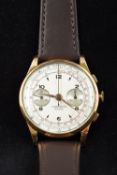 A 1930s 18 ct gold Swiss chronograph gentleman's wristwatch The dial with two subsidiary movements,