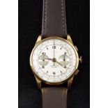 A 1930s 18 ct gold Swiss chronograph gentleman's wristwatch The dial with two subsidiary movements,