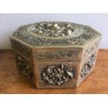 A Chinese white metal (tests as silver) box and cover Of octagonal section and decorated with