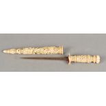 An 18th/19th century carved bone handled dagger With shaped pierced blade,