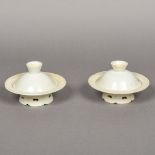 A pair of Chinese porcelain cups with stand Each with lappet moulding and pierced foot. 8.