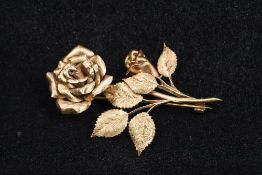 A 9 ct gold brooch Formed as a rose. 5.5 cm high.