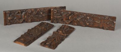 Four 17th/18th century carved oak panels Each with figural carvings. The largest 47 cm long.