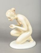 An Italian Ronzan pottery Lenci style figure Modelled as a crouching nude,