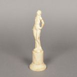 JOE DESCOMPS (1869-1950) An Art Deco ivory figure "REGAL" Carved as a Middle Eastern princess,