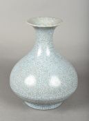 A Chinese porcelain Ge type vase The overall blue/grey glaze suffused with a matrix of dark grey