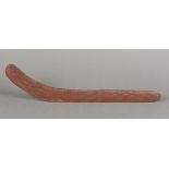 A painted wooden boomerang,