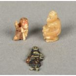 A Japanese carved ivory toggle Worked as a monkey; together with another,
