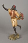 An Austrian cold painted bronze model of an Arab gentleman Modelled running holding a red scarf,