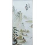 A Chinese porcelain plaque Decorated with an extensive mountainous river landscape,