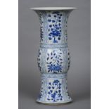 A Chinese blue and white porcelain gu vase Decorated with floral sprays,