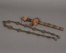 A 19th century Chinese coin sword Of typical form; together with an Eastern cast bronze belt,