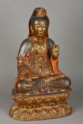A large 19th century gilt and painted bronze figure of Buddha Typically modelled wearing a