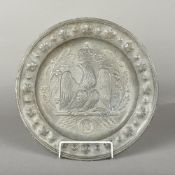 A 19th century Continental pewter charger Worked with a Napoleonic crest. 38.5 cm diameter.
