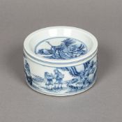 A Chinese blue and white porcelain pot and cover Of circular section,