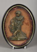 An 18th/19th century cast wax portrait of a young John the Baptist Oval framed and glazed. 19.