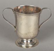 A George III silver twin handled tankard, hallmarked Newcastle, circa 1790,