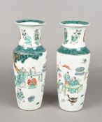 A pair of Chinese famille verte porcelain vases Decorated in the round with scholarly and other