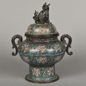 A 19th century Chinese cloisonne censor The removable lid mounted with a temple dog,