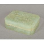 A Chinese jade box and cover Of lobed rectangular form,
