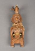 An African carved wood Yoruba tribe Ibeji figure Typically worked with beaded decoration.