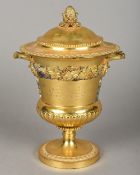 An Edwardian silver gilt trophy cup, hallmarked for London 1903, maker's mark of C.S.