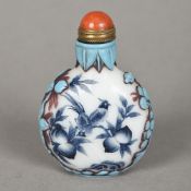 A Chinese painted cameo glass snuff bottle Decorated with birds and insects amongst fruiting