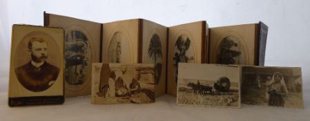 A late 19th century small gilt embossed leather covered concertina type photograph