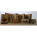 A late 19th century small gilt embossed leather covered concertina type photograph