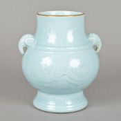 A Chinese porcelain blue ground vase Decorated with lappets and scroll work and with twin elephant