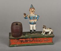 A cast iron TRICK DOG money bank With sprung and hinged dog. 20.5 cm wide.