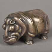 A Russian silver model of a hippopotamus Modelled standing on all fours with cabochon ruby inset