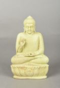 A Chinese carved hardstone figure of seated Buddha Worked in Dhama Chakra pose. 16 cm high.