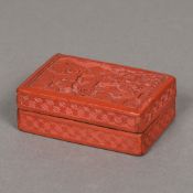 A 19th century Chinese cinnabar lacquered box and cover Worked with figures in a landscape,