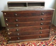 A Victorian mahogany plan chest The moulded rectangular top above six deep drawers with turned