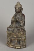 An antique cast iron model of Buddha Typically modelled seated in the lotus position on a mask cast