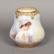 A 19th century Royal Bonn porcelain vase Hand painted with a portrait within scrolling gilt bands,