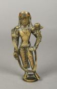 An inlaid bronze figure of a deity, possibly Nepalese Modelled standing. 13 cm high.