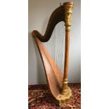 A late 19th/early 20th century American gilt and satinwood harp The brass side plate inscribed The