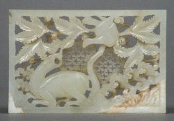 A Chinese carved celadon and russet jade pierced panel representing Autumn 7.5 cm wide.