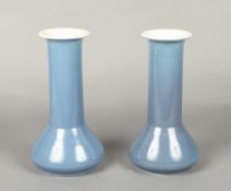 A pair of Ault pottery vases Of angular form with tall neck, impressed marks to base. 26.5 cm high.