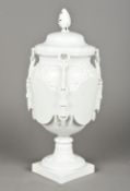 A 19th century Jacob Petit Paris white porcelain vase and cover Of urn form,