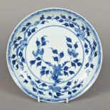 An 18th century or earlier Chinese blue and white porcelain saucer dish Decorated in the Ming