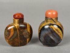 A Chinese carved tiger's eye snuff bottle and stopper Together with another, carved hardstone. 6.