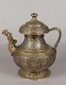 An Eastern silvered bronze lidded ewer Decorated with peacock vignettes and with dragon moulded